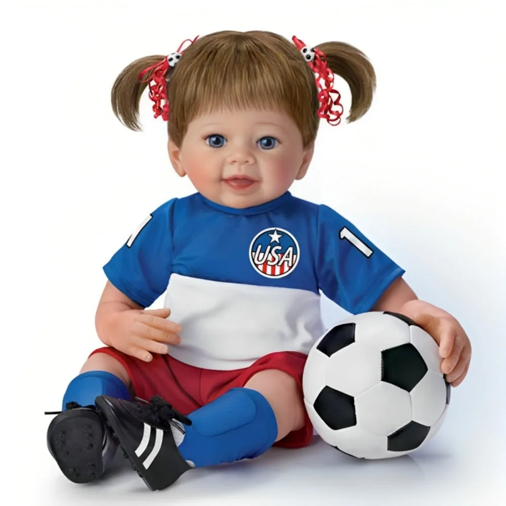 The Ashton-Drake Galleries Dream Big Child Doll Poseable Soccer Player Doll in Real Touch® Vinyl Skin with Soccer Outfit Shin Guards and Miniature Soccer Ball by Master Doll Artist Linda Murray 18-inches